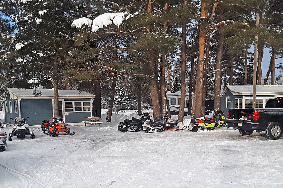 Snowmobiles at Along the River Campground & Cabins