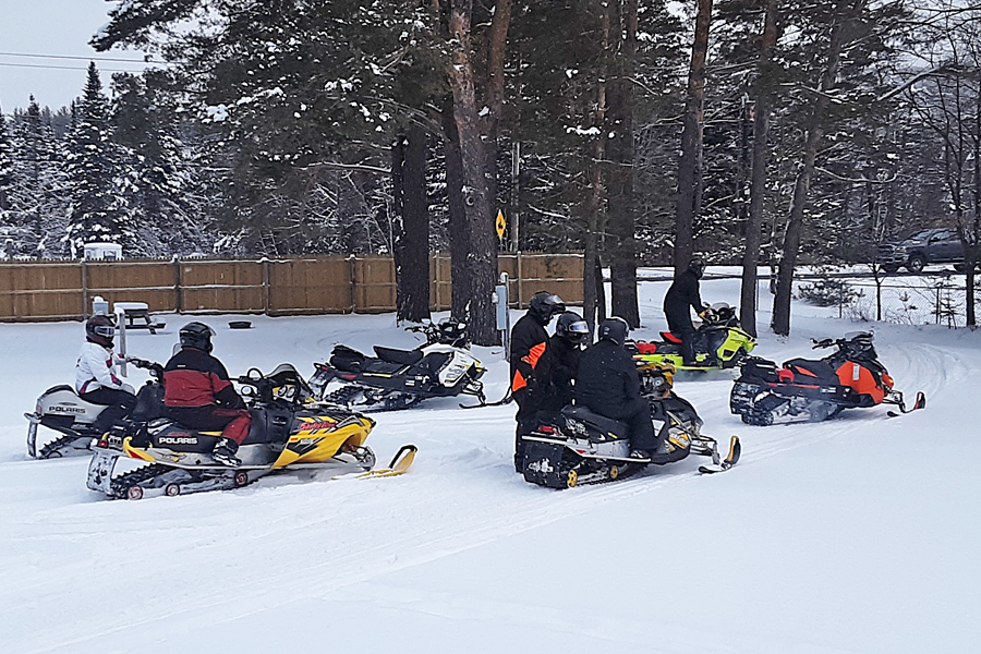 Snowmobiles at Along the River Campground & Cabins